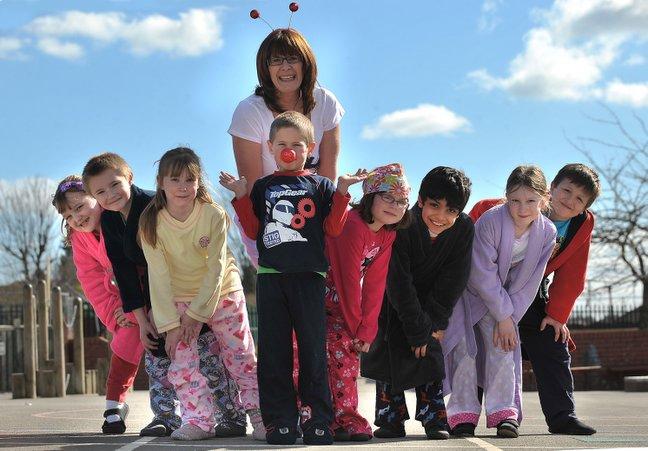 Swain House Primary School pupils came to school in pyjamas for Comic Relief, Pictured are Liam Smith, Chloe Breccini, Benjamin Butt, Daisie Longbottom, head teacher Dianne Rowbotham, Daniel Smith, Freya Thackray, Joe Ellias and Maisie Ellis-Gunnell.