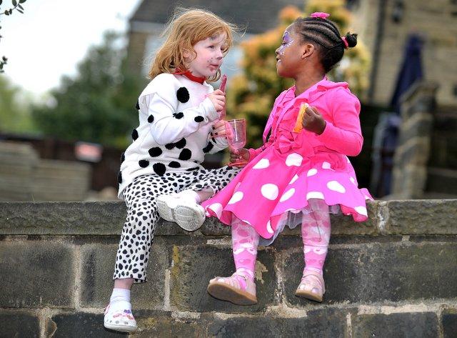 Lucy Proctor, 5, and Pria Daniel, 3, get in the mood at Thornton