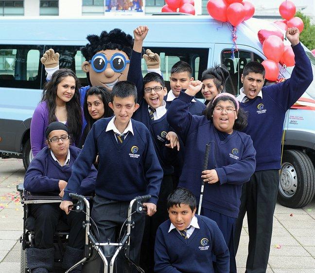 A Bradford school has been given a Variety Club Children’s Charity Sunshine Coach to help its pupils get out and about. 
Students at Challenge College got to see their new coach when it was presented by the school’s corporate sponsor Interlink Expres