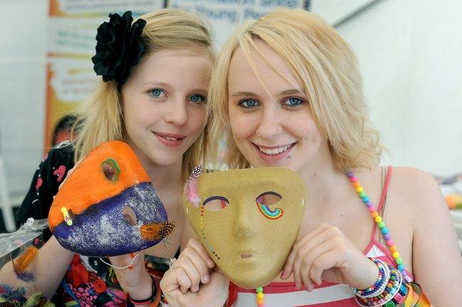 Holleigh Jankowicz, 16, and Leona Clarke, 16, who were making masks at the Pride event.