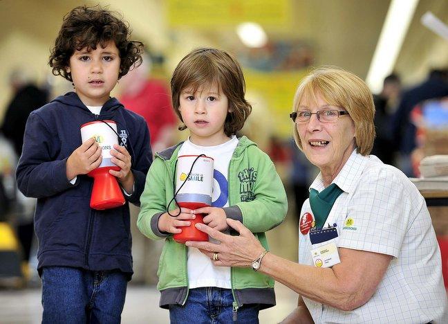 Staff and customers gathered at Morrisons stores across the UK as the Bradford-based supermarket kick-started its partnership with Save the Children. 
Brothers Joseph and Jacob Fox with staff member Catherine Finan at Morrisons Five Lane Ends store.