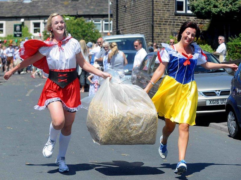 Runners turned out in fancy dress for the annual Oxenhope Charity Straw Race. Runners faced sweltering conditions in their bid to raise funds for local charities.