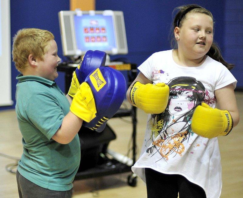 Youngsters across the district took part in an Olympic-themed event at Richard Dunn Sports Centre to celebrate their success at becoming fitter, healthier and happier through attending the Mind, Exercise, Nutrition … Do it! (Mend) programme.