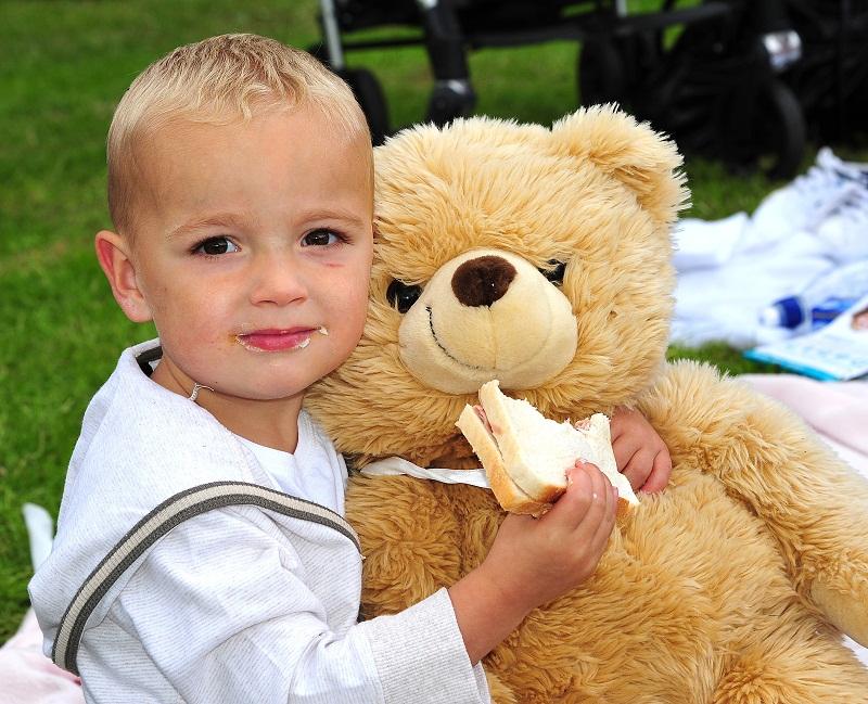 Callum Smith, two, from Shipley offers his teddy a sandwich.