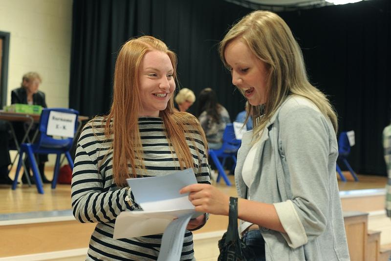 Samantha Carter and Becky Howell celebrate their  results together at Bingley Grammar School