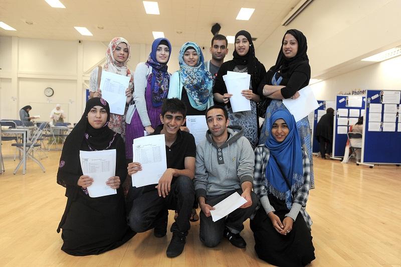 Challenge College pupils celebrate their outstanding A Level results.