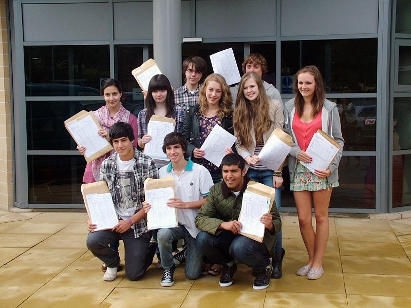 Heckmondwike Grammar pupils celebrate with their GCSE results papers