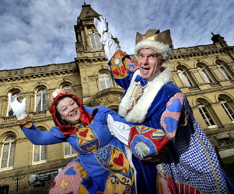 King and Queen of Hearts John and Jacqui Lambert, of Shipley-based Q20 theatre company, performed outside Victoria Hall as Saltaire Festival organisers prepared to welcome thousands of visitors to the village