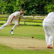 Matty Roberts (bowling) took three wickets and then scored 68 for Bingley Congs, proving instrumental in their win over title rivals Oakworth. Picture: Phil Jackson.