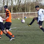 Kamran Khan (number 7) grabbed a hat-trick as Toller thrashed Lower Hopton 7-1 in the Yorkshire Amateur League Supreme Division Picture: Richard Leach