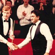 Steve Davis shakes hands with Joe Johnson in the 1986 world final, which saw Bradford's Johnson pull off one of the game's biggest shocks