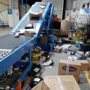 Hermes launches investigation as leaked photos show packages strewn across depot floor