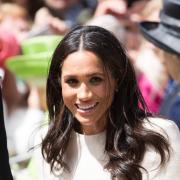 The Queen and Meghan Markle visit Chester. Pic: Meghan Markle meets the crowd. GA140618A.