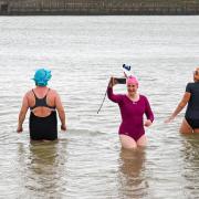 Members of the 'Salty Seabirds' wild swimming group. Pic: Simon Dack/Alamy Live News