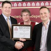 Gordon Tilley, left, of award sponsor Crisp Malting with Stewart Ross and Chris Ives of Ilkley Brewery
