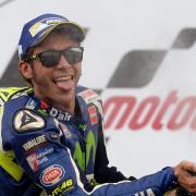 Valentino Rossi at Silverstone in 2016 after coming third, one of his nearly 200 podiums in MotoGP. Picture: Joe Giddens/PA Wire.