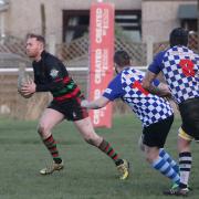 Wibsey (black, red and green) won this game against Knottingley on January 29, but have only played one league match since. Picture: Alex Daniel.