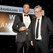 Manufacturing apprentice James Wright (left) collects his award at Thursday’s ceremony