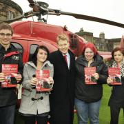 Richard Harpin with Craven College students after he flew in to speak to budding entrepreneurs