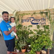 Emon Choudhury with his daughter after completing the Great North Run