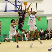 Justin Williams (centre, in black) put up 18 points for Bradford in their narrow defeat to Worthing. Picture: Max Lomas.
