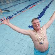Former CDC chair, the late Donny Whaites, who died in 2015, at the launch in 2014 of the annual fundraising swimming  challenge