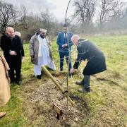 The tree planting in memory of the late Councillor Abid Hussain