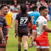 Quentin Laulu-Togaga'e alongside his son Phoenix during Sheffield's win at Cougar Park in April 2023.