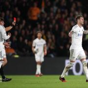Joe Rodon (right) looks aghast after being sent off in Leeds' 0-0 draw on Wednesday night with Hull.