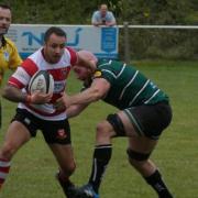Cleckheaton (red and white) gave Ilkley a brilliant game, but fell short at the last.
