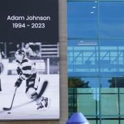 A message board with a tribute to Nottingham Panthers’ ice hockey player Adam Johnson outside the Motorpoint Arena in Nottingham