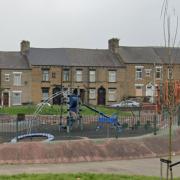 View of terraced houses and Attock Park, Bradford
