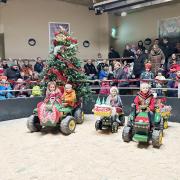 CCM Xmas kids tractor drive. From left, winners William and Olivia Coates, runner-up Penny Walker and third placed Arthur Bradley