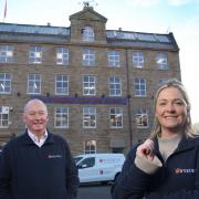 Wyedean’s Susannah Walbank with father Robin Wright outside the refurbished mill. Pic: Lorne Campbell/Guzelian