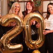 Staff at Seymours Cutting Room celebrate being in business for 20 years