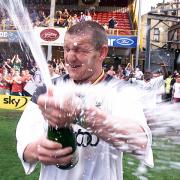Dean Windass celebrates City's Premier League survival in May 2000.