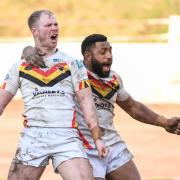 Kieran Gill and Keven Appo celebrate the former's late try against Swinton in the 1895 Cup quarter-final, which sealed Bulls' spot in the last four.