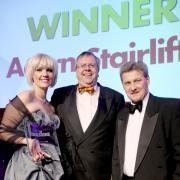 ACCOLADE: Vicci Lamb, Acorn's export manager, and Dave Belmont (centre) receive the export prize at the Made in Yorkshire Awards.