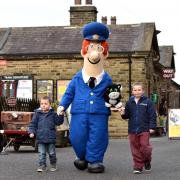 Postman Pat on the Keighley & Worth Valley Railway, with youngsters William and Oliver Horsfield