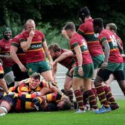 Bees skipper Tom Booth, seen celebrating a try against Heath, is set to return on Saturday for a vital North One East clash at second-placed Pocklington