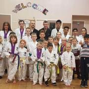 The TSX Taekwondo squad at St Cuthbert's Church in Wrose, with instructor David Fairley on the far left