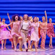 Lucy May Barker (front) with cast members of Mamma Mia. Pictures BrinkhoffM and Agenburg