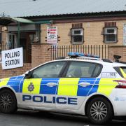 Police officers outside Frizinghall Community Centre