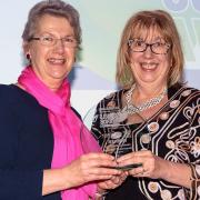 SUPPORT: Lindsey Wharmby, of Ilkley Grammar School, is presented with the Governor of the Year  Award by Cllr Val Slater