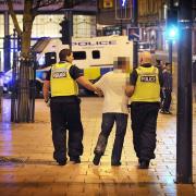 Police pursue and arrrest a drunk on a Friday night in Bradford City centre.