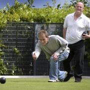 Brighouse Sports' Mark Regan, left, bowled consistently well to win the Bradford Hospital Handicap