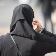 A Muslim woman wearing a hijab. Photo: Press Association