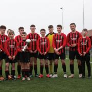 Bingley Juniors under-14s with their trophy