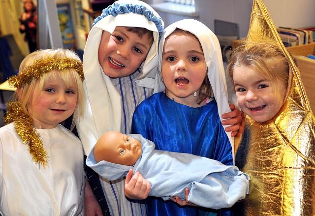 Early Years classmates Gabriella Bean, four, Owen Butterworth, five, Olivia Jardine four, and Ellie-Mae Oxley, four, who star in Christmas Spells at Hill Top Primary School, Low Moor, Bradford.