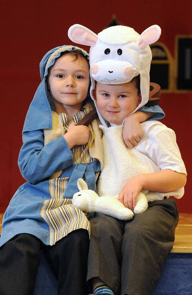 Shepherd Harvey Pearson and Alfie Spencer as the lamb in the Nativity at Shibden Head Primary, Queensbury